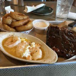 Third rack, ribs with shrimp, scampi, and house made onion rings