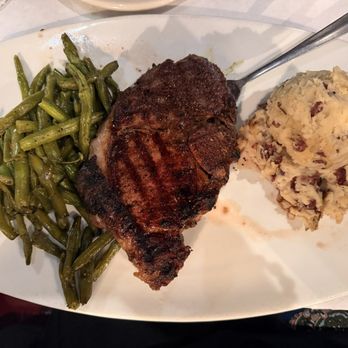 Amerigo Italian Restaurant - Ribeye with mashed potatoes and green beans - Italian Near Me - Memphis, Tennessee Amerigo Italian Restaurant - Ribeye with mashed potatoes and green beans - Italian Near Me - Memphis, Tennessee