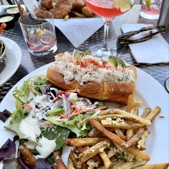 The Powder Keg Pub - The crab roll with garlic fries and a side salad w/bleu cheese dressing and a cosmopolitan - Burgers Near Me - Hercules, California The Powder Keg Pub - The crab roll with garlic fries and a side salad w/bleu cheese dressing and a cosmopolitan - Burgers Near Me - Hercules, California