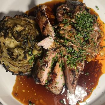 Darkroom - Jamaican jerk pork tomahawk- the cabbage has the most insane texture and the pork was perfectly cooked - Wine Bars Near Me - Santa Ana, California