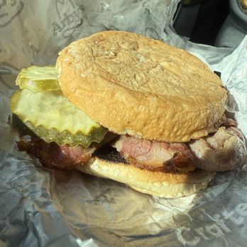 Arby's - Three pickles burnt bun as you can see at about six slices of fatty meat... does this look like a $12 sandwich to you? - Fast Food Near Me - San Diego, California Arby's - Three pickles burnt bun as you can see at about six slices of fatty meat... does this look like a $12 sandwich to you? - Fast Food Near Me - San Diego, California
