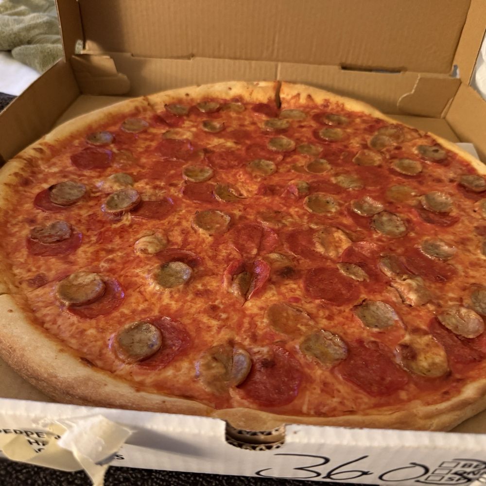 Lucia Pizza - Sausage and pepperoni pizza. - Pizza Near Me - Flushing, New York Lucia Pizza - Sausage and pepperoni pizza. - Pizza Near Me - Flushing, New York
