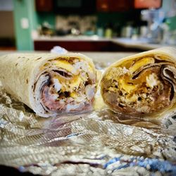 St Mary's Mexican Food - Eggs, cheese, potato, added beans, cheese, onion.