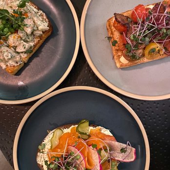 Eleven - Butter Poached Shrimp (top left) Ho Farms Tomato (top right) Sake Cured Salmon (bottom middle) - Cocktail Bars Near Me - Honolulu, Hawaii