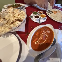 Great butter chicken and some Garlic Naan with the rice that is also super good