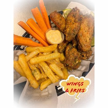 Tropical Venue - chicken wings and fries with carrots and celery - Fast Food Near Me - Toronto, Ontario Tropical Venue - chicken wings and fries with carrots and celery - Fast Food Near Me - Toronto, Ontario