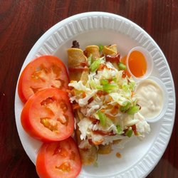 La Parrilla Fritanga - Tacos de carne o pollo.