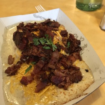 Biscuit Bitch - This biscuit has bacon and cheese and their yummy gravy - Breakfast & Brunch Near Me - Seattle, Washington Biscuit Bitch - This biscuit has bacon and cheese and their yummy gravy - Breakfast & Brunch Near Me - Seattle, Washington