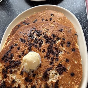 Dave's Diner - Mounds Pancakes; chocolate chips and shredded coconut. Butter and warm maple syrup. These pancakes are huge! - Diners Near Me - Middleboro, Massachusetts Dave's Diner - Mounds Pancakes; chocolate chips and shredded coconut. Butter and warm maple syrup. These pancakes are huge! - Diners Near Me - Middleboro, Massachusetts
