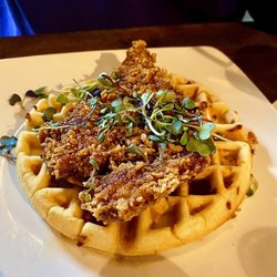 Caston & Main Brew Yard - Cornflake fried chicken, jalapeño cheddar waffle, hot honey, whipped maple butter