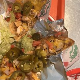 Here is an example of a "guacamole portion" for a large nachos - the size of a single jalapeno slice!