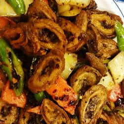 Dynasty Restaurant - Pig intestine! Spicy and deliciously fatty.  One of my favorites. Time to be adventurous and give it a try:] I dare you.