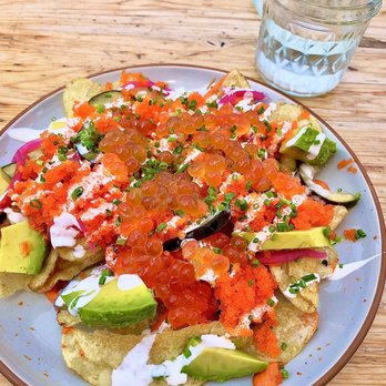 Crudo e Nudo - Caviar Nachos and a glass of agua - Seafood Near Me - Santa Monica, California
