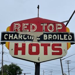 a sign for a hot dog restaurant