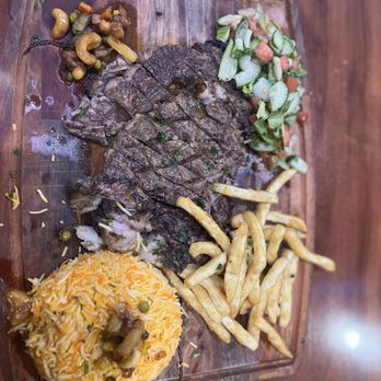 Abu Naji Restaurant - Ribeye - Salad Near Me - Tampa, Florida Abu Naji Restaurant - Ribeye - Salad Near Me - Tampa, Florida
