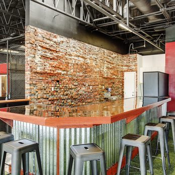ABQ Ax - We feature beers on tap by Red Door and delicious made to order food. - Axe Throwing Near Me - Albuquerque, New Mexico
