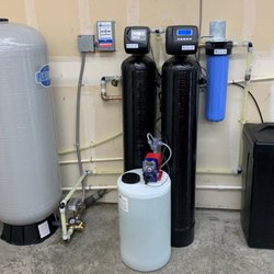 Northwest Water Treatment - This whole-home water filtration system for a family in Maple Valley, WA, removes iron, manganese, sediment, and sulfur.