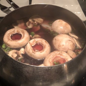 The Melting Pot - Coq au Vin - all the veggies - Fondue Near Me - Austin, Texas