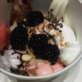 Yogurtland - yogurt topped with blackberries, sprinkles, and almonds (30 cents/oz) - Ice Cream & Frozen Yogurt Near Me - Arcadia, California Yogurtland - yogurt topped with blackberries, sprinkles, and almonds (30 cents/oz) - Ice Cream & Frozen Yogurt Near Me - Arcadia, California