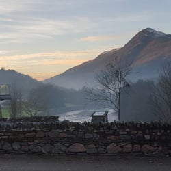 Highland Getaway - The river Leven, the "Highland Getaway" Pub with its terrace on the left.