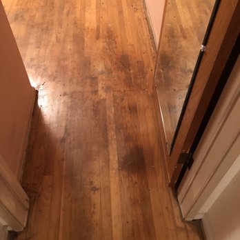 SP Hardwood Floor - a wood floor in a hallway - Flooring Near Me - Pomona, California