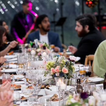 MadeByRK - Guests enjoy the wedding feast. Photo by Jason Rhee Photography. - Caterers Near Me MadeByRK - Guests enjoy the wedding feast. Photo by Jason Rhee Photography. - Caterers Near Me