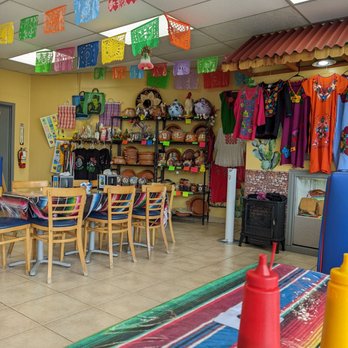 Itacate Taqueria - tables and chairs in a mexican restaurant - Tacos Near Me - Humble, Texas Itacate Taqueria - tables and chairs in a mexican restaurant - Tacos Near Me - Humble, Texas