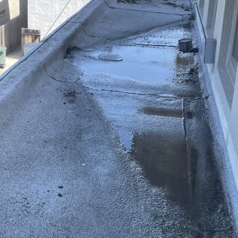 America Group Roofing - Before -Pooling water with poor drainage - Roofing Near Me America Group Roofing - Before -Pooling water with poor drainage - Roofing Near Me