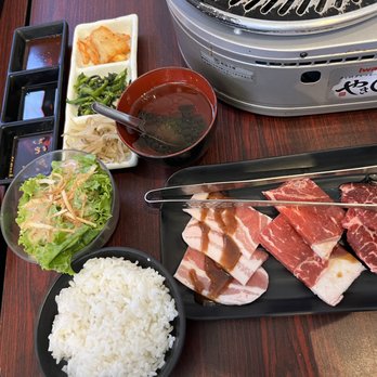 Yakiniku Sizzle - Lunch Hour special comes with salad, seaweed soup, 3 sides, 3 choices of meat, and rice with refill - Japanese Near Me - Honolulu, Hawaii