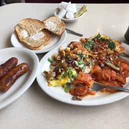 The farmers omelette, rye toast buttered and sausage links which was way to much after that tasty meal. Definitely recommend... The farmers omelette, rye toast buttered and sausage links which was way to much after that tasty meal. Definitely recommend...