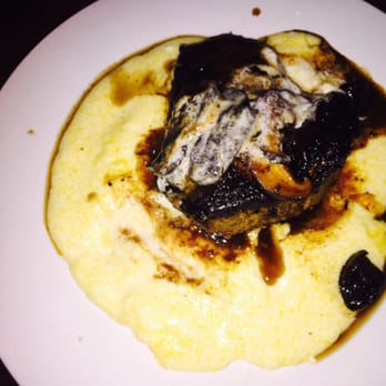 Flying Pig Pub & Kitchen - New York steak with mushrooms on grits - Pubs Near Me - Oceanside, California