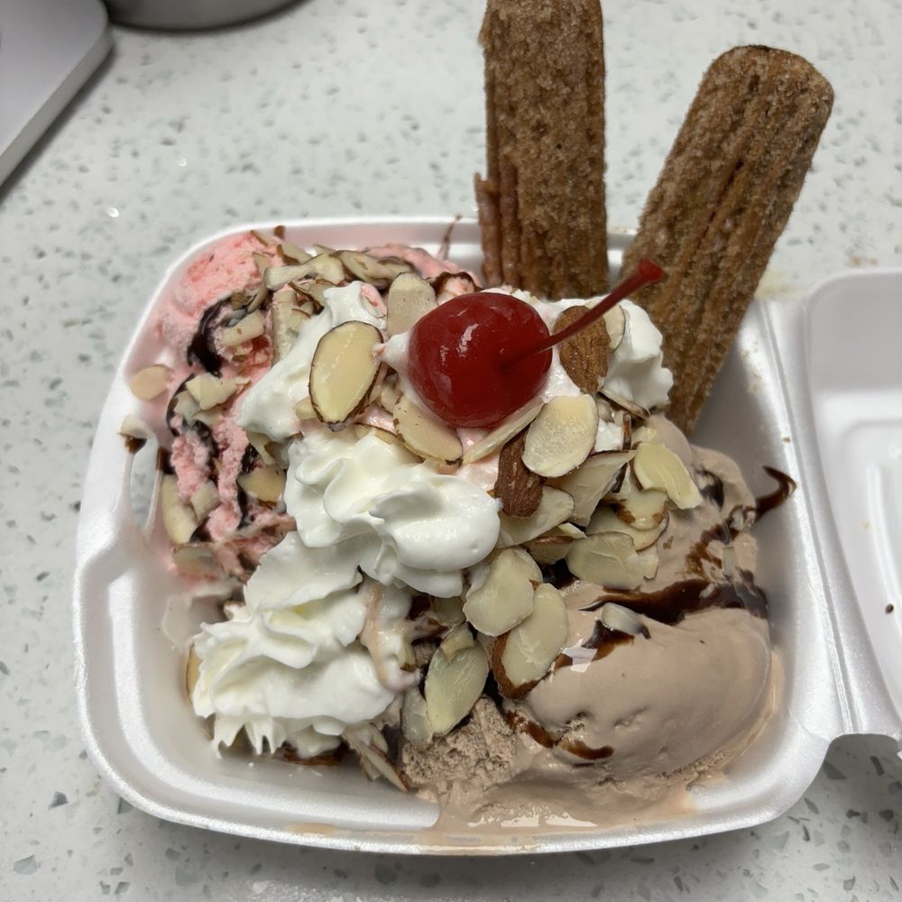 Strawberries and Cream - Churro sundae! - Ice Cream & Frozen Yogurt Near Me - Forney, Texas Strawberries and Cream - Churro sundae! - Ice Cream & Frozen Yogurt Near Me - Forney, Texas