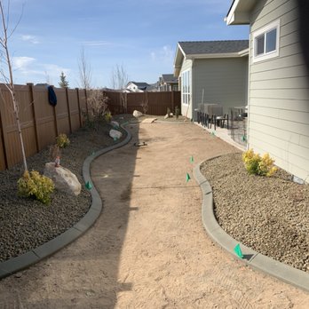 Ruiz Landscape - a gravel path in front of a house - Landscaping Near Me Ruiz Landscape - a gravel path in front of a house - Landscaping Near Me