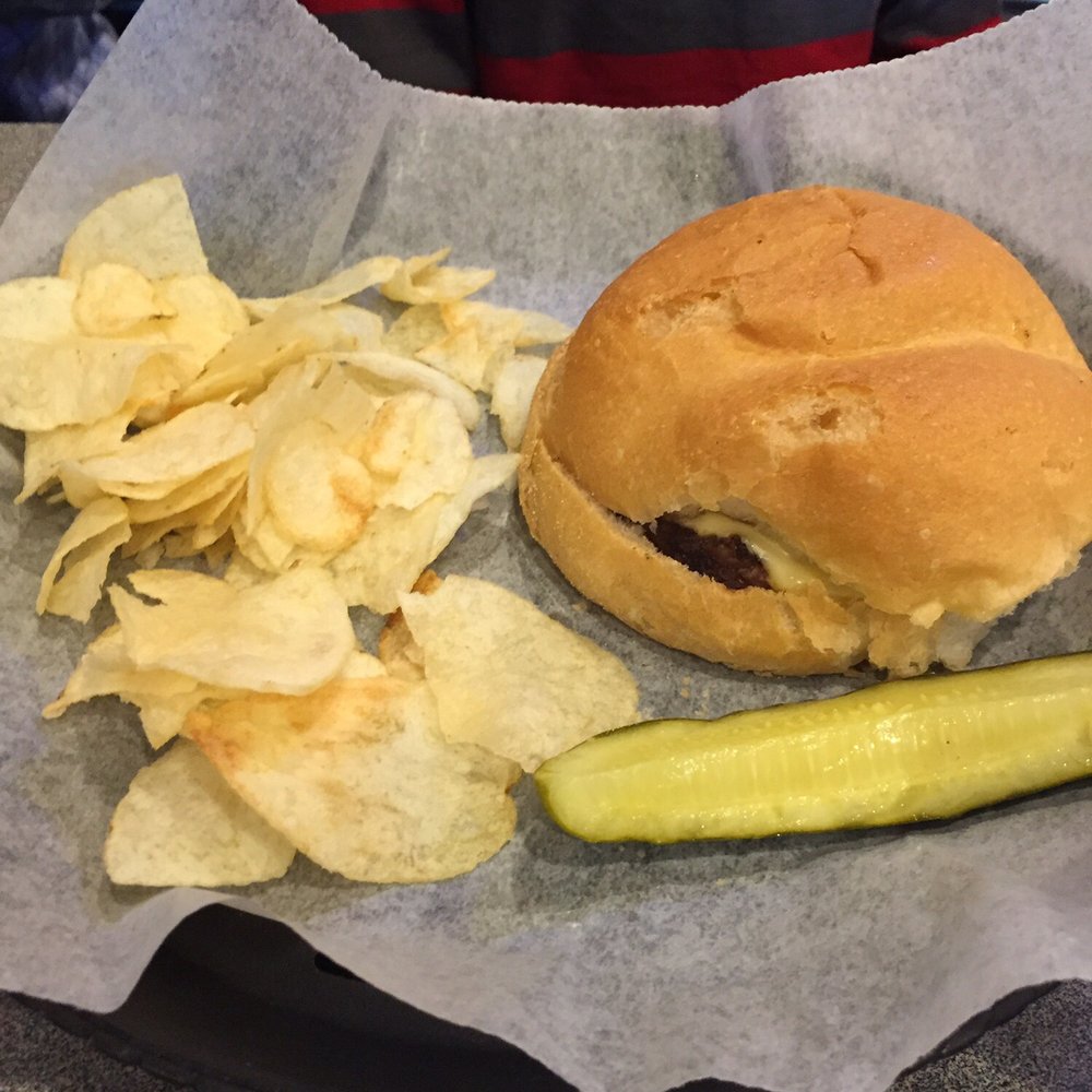 Big Apple Pub & Grill - Cheeseburger with Chips and Pickle Spear as the side - Nightlife Near Me - Manitowoc, Wisconsin Big Apple Pub & Grill - Cheeseburger with Chips and Pickle Spear as the side - Nightlife Near Me - Manitowoc, Wisconsin