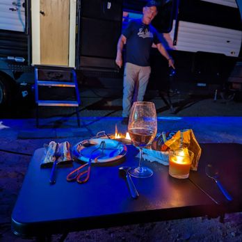 Pink Flamingo RV - Tim is now a master at camping. He set up our propane fire pit, our Bluetooth speakers under our electric awning. - RV Dealers Near Me - Indio, California Pink Flamingo RV - Tim is now a master at camping. He set up our propane fire pit, our Bluetooth speakers under our electric awning. - RV Dealers Near Me - Indio, California