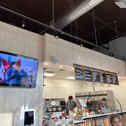 Wasabi Sushi & Poke - Food menu board