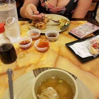Grand Buffet - Combined picture as you can see the sauces in the middle. Overall the food was okay not a big selection - Buffets Near Me - Modesto, California