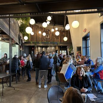 Prison City Brewing - a crowd of people sitting at tables - Brewpubs Near Me - Auburn, New York