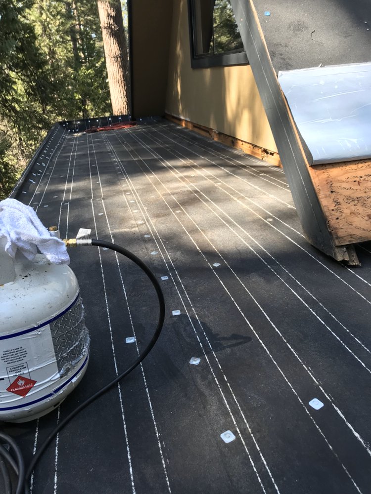 Slide of Warren Roofing