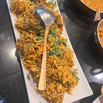 Apna Pind - The goat biryani was so tasty with bits of whole spices in it and lots of tender and tasty goat meat. - Indian Near Me - Queens, New York