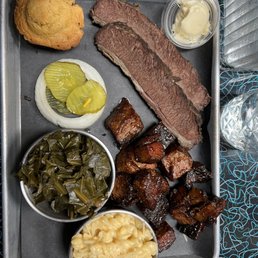 Two meat plate w/ collards Mac and Cheese. Two meat plate w/ collards Mac and Cheese.
