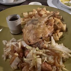 Le Bistro - Duck confit. Terrible pairing of sides basically breakfast grade has potatoes and cabbage