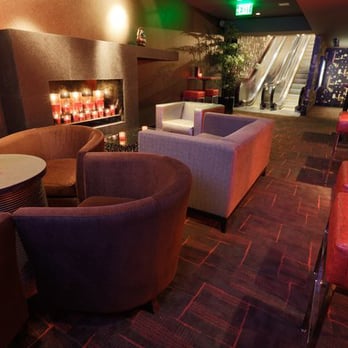 IPIC Pasadena - At the bottom of Escalator #1 there is a quaint seating area mezzanine that looks down on the bar area. - Cinema Near Me - Pasadena, California