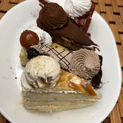 Farine Baking - Assortment of cake slices- gulub jamun cheesecake still reigns supreme