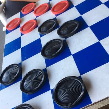 Cracker Barrel Old Country Store - Sitting outside in the rocking chair playing old fashion checkers - American Near Me - Murfreesboro, Tennessee Cracker Barrel Old Country Store - Sitting outside in the rocking chair playing old fashion checkers - American Near Me - Murfreesboro, Tennessee