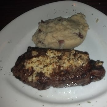 Stevens' - New York Strip. Garlic crust and New Orleans smashed potatos - American Near Me - Gurnee, Illinois Stevens' - New York Strip. Garlic crust and New Orleans smashed potatos - American Near Me - Gurnee, Illinois