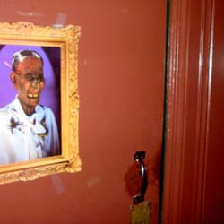 The Station Bar - Stinky bathroom + creepy picture
