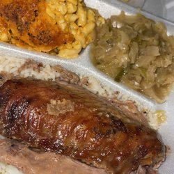 Turkey Wings over rice with mac & cheese, cabbage, & cornbread