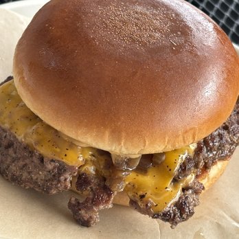 Cosmos Burger - COSMO BURGER (6 oz brisket patty, Cosmo's sauce, caramelized onions, cheddar cheese, and pickles on a brioche bun) - Burgers Near Me - Oceanside, California Cosmos Burger - COSMO BURGER (6 oz brisket patty, Cosmo's sauce, caramelized onions, cheddar cheese, and pickles on a brioche bun) - Burgers Near Me - Oceanside, California