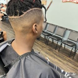 Frenchie's Classic Barbershop - By --Carl "The Barber"